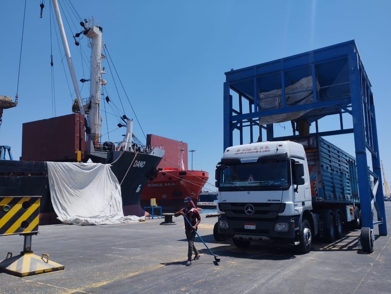 Trucks loading at port