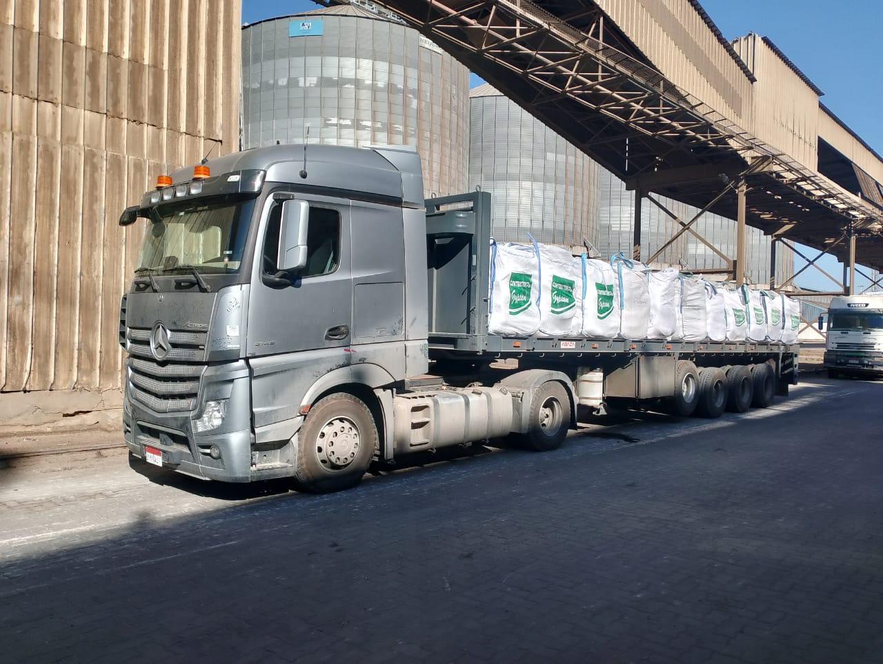 Mercedes Actros loaded with commodity bags at silo